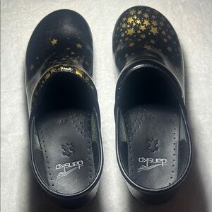 Dansko Women Black and Gold Star Clogs